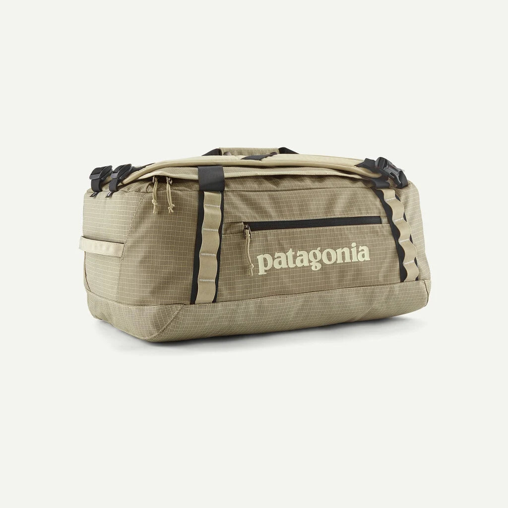 patagonia black hole line Duffel 55L Discover the ultimate companion for every adventure with this premium unisex travel bag in the striking Peach Sherbet colour Patagonia Black Hole Duffel