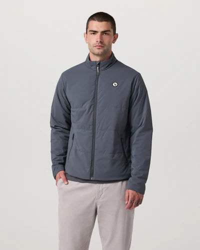 Man wearing a gray Vuori Echo Insulated Jacket 2.0 on a white background